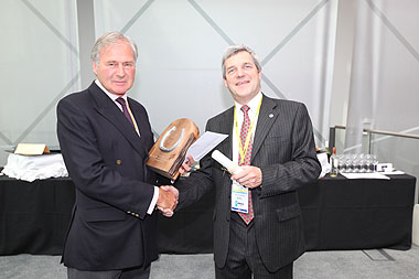 Brigadier Paul Jepson receives The Blue Cross Equine Welfare Award from Zair Berry, Chairman of The Blue Cross